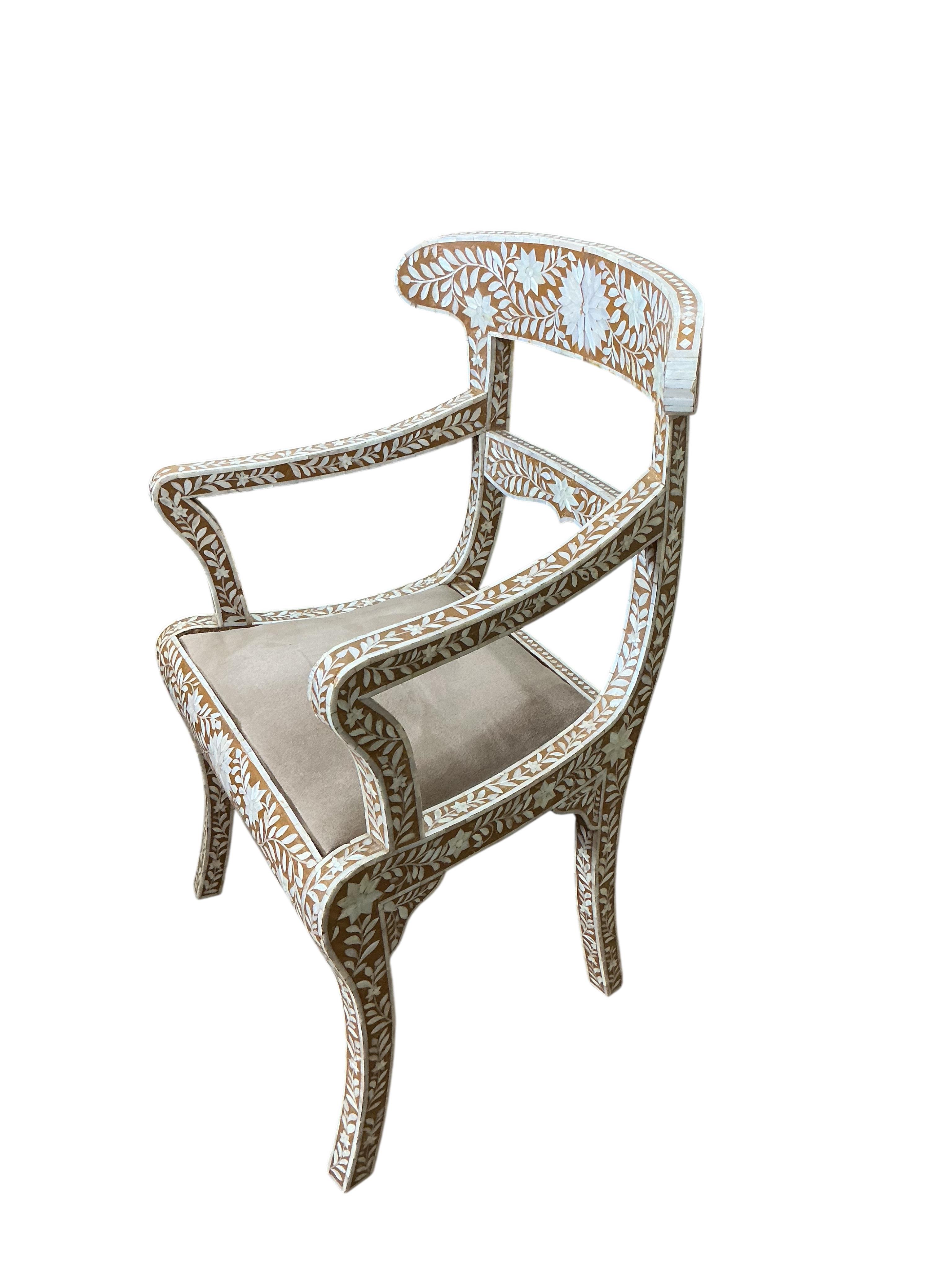 A 19th century Anglo Indian mother of pearl inlaid elbow chair, width 56cm, depth 44cm, height 90cm